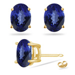 1.30 Cts of 6x5 mm AAA Oval Tanzanite Stud Earrings in 14K Yellow Gold