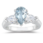 0.20 Cts Diamond & 1.34 Cts Sky Blue Topaz Three Stone Ring in Platinum